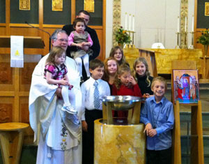 Pastor Elkin with the the first communion families