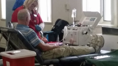 Lou gives blood