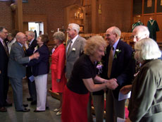 Greeting the milestone couples after the service.