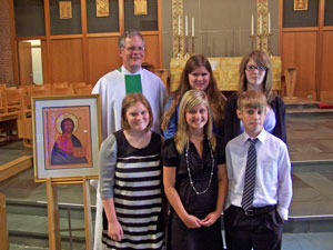 Christina Comini, Brandon Fortin, Paige Fortin, Sara Jones and Hannah Ramsauer with Pastor Elkin