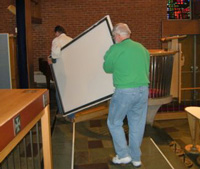 Panels are returned to the nave