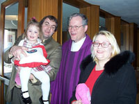 The Gregory family with Pastor Elkin