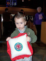 Holding a prayer pillow