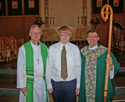 Riley with pastor and bishop