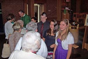 Confirmands being congratulated after the service