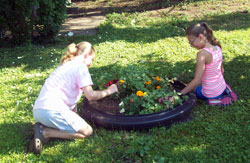 Tweens working in the yard