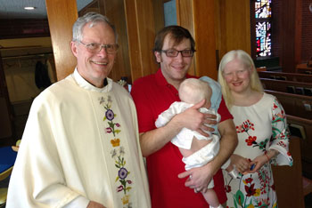 Pastor Elkin with Max, Richard and Kristin Applegate