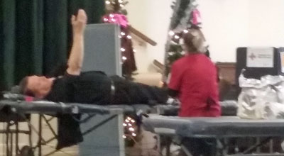 Pastor West giving blood