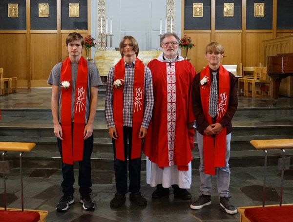 Levi Gair, Hudson Ott and Nolan with Pastor Vasey