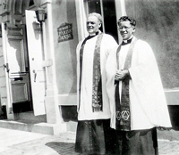 Pastors Houser and Neumeyer in front of the parish house